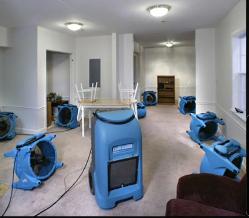 Air movers and dehumidifier setup for Water Damage Restoration in Le Mars